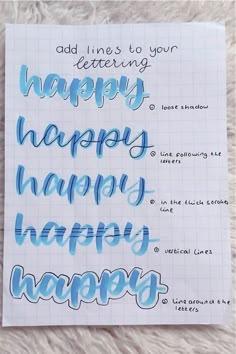 some type of writing that is on top of a sheet of paper with the words happy written