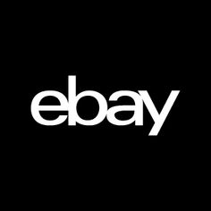 the ebay logo is shown in white on a black background, and it appears to be made out of paper