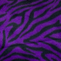 purple and black zebra print fabric close up