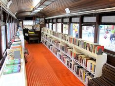 a long row of bookshelves filled with lots of books