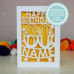 a birthday card with the words happy birthday in white and gold on it, surrounded by toys