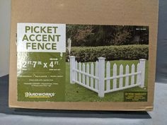 a cardboard box with an image of a picket accent fence