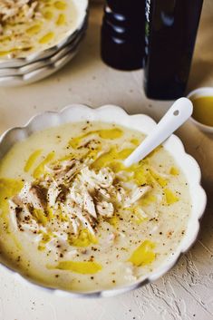 a bowl of greek lemon rice soup on a table