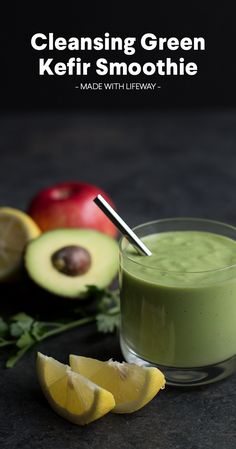 an avocado smoothie is garnished with fresh fruit