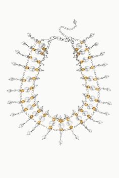 Experience the harmonious blend of natural beauty and timeless elegance with our Pearls and Crystals Symphony Necklace. Hand-crafted from freshwater pearls and crystals in various sizes, this exquisite choker-style necklace is the epitome of sophistication. The luminous natural pearls framed with golden Swarovski crystals, create a mesmerizing effect that will add a touch of glamour to any outfit, especially an off-shoulder dress or blouse. Ivory Sea Cultured Pearls Golden Swarovski Crystals Met White Double Strand Pearl Necklace For Party, White Pearl Embellished Choker Necklace, White Akoya Pearl Necklace For Party, White Pearl Chain Choker, Choker Style Necklace, Crystal Choker Necklace, Meaningful Jewelry, Crystal Choker, Choker Style