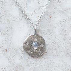 Our snowflake necklace has been star set with a moonstone that is surrounded by brilliant cut diamonds. Chain measures 45cm. Snowflake Necklace, Perfectly Imperfect, Fine Jewellery, Brilliant Cut Diamond, Fair Trade, Moonstone, Diamond Cuts, Silver Necklace, Ring Size