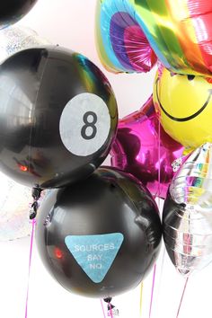 the balloons are all different colors and have numbers on them