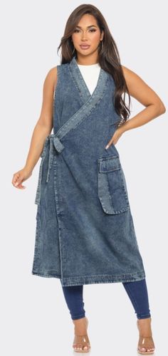 Denim wrap dress. Sleeveless. Cargo pocket on one side and regular pocket on the other side. Splits on both sides at bottom hem. Denim Wrap Dress, Side Splits, Cargo Pocket, Pocket Dress, Dress Sleeveless, Denim Vest, Vest Dress, Xl Dress, The Other Side