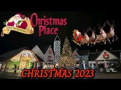 the christmas place sign with santa's sleigh and reindeers