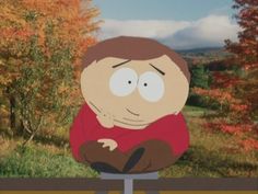 a cartoon character sitting on top of a bench in front of fall trees and foliage