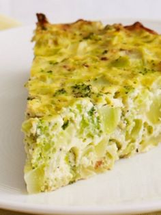 a piece of broccoli quiche on a white plate