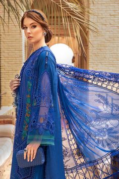 Brand: Maria.BProduct Code: D-2404-BCollection: Maria.B Unstitched Embroidered Luxury Lawn CollectionFabric: Lawn DESIGN DETAILS: ShirtEmbroidered Organza Neck Patch Left & RightEmbroidered Front PatchEmbroidered Lawn Side Panels Left & RightDyed Back & SleevesEmbroidered Organza Sleeves PatchEmbroidered Organza Sleeves PattiEmbroidered Organza Ghera Patti DupattaBurnout Silk DupattaEmbroidered Organza Dupatta Patti TrousersDyed Cambric TrouserColor: Blue CARE INSTRUCTIONS: Extra Fabric Has Been Used For Shoot Original Color May Vary Slightly From The Picture Dry Clean Recommended Iron The Clothes At Moderate Temperature Do Not Use Bleach, Or Stain Removing Chemicals Damp Fabric Should Not Be Exposed To Sunlight DISCLAIMER:* Lining, Laces, and Tassels are not included in unstitched variant Pakistani Boutique, Lawn Design, Pakistani Lawn Suits, Embroidered Organza