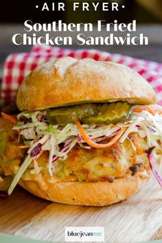 an air fryer chicken sandwich with coleslaw and pickle slaw on it