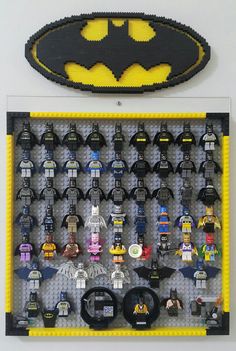 the lego batman logo is on display with other toys