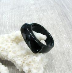 "Black onyx carved stone faceted signet rings in sizes from 4 to 9, This design is unisex, may look good as a pinky ring for man or woman. Shape: wide band with faceted \"signet\" top. Top side: 6 - 7 mm wide. Band size: minimum 5 mm wide and 2-3 mm thick. You will receive one of the rings in your chosen size. Ring sizes: 4, 4.5, 4 3/4, 5, 5.5, 5 3/4, 6, 6 1/4, 6.5, 6 3/4, 7, 7 1/4, 7.5, 7 3/4, 8, 8.5, 8 3/4, 9, 9 1/4 ( US and Canada ) H 1/2, I 1/2, J 1/4, J 1/2, L, L 1/4, M, M 1/2, N, N 1/2, O, Asexual Ring, Ring For Man, Mens Pinky Ring, J 1, Gemstone Meanings, Signet Rings, Carved Stone, Pink Agate, Agate Jewelry