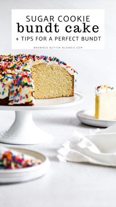 a white cake with sprinkles on it and the words sugar cookie bundt cake tips for a perfect bundt