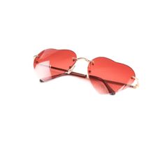 This romantic, heart shaped sunglasses feature a frameless silhouette and are great for concerts, festivals, or everyday use. Silicone nose pads Lens: Graduated Red (Red to clear) Rimless Metal Tone: Gold Trendy Heart-shaped Sunglasses For Valentine's Day, Red Rimless Sunglasses For Party, Red Heart-shaped Sunglasses For Valentine's Day, Red Rimless Sunglasses For Summer, Trendy Red Rimless Sunglasses, Heart-shaped Sunglasses For Valentine's Day, Red Heart-shaped Tinted Sunglasses, Trendy Red Heart-shaped Sunglasses, Romantic Heart