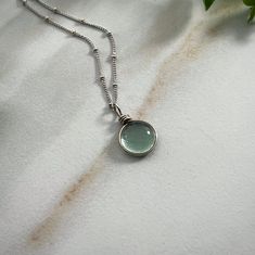 "Sterling Silver Rain Drop Necklace, Aesthetic Necklace Cottagecore Jewelry, Bohemian Necklace for Women Nature Jewelry Gift for Her Our Spring Rain Drop Necklace is made with sterling silver. The silver brightens this beautifully simple design. This Earthy Necklace is the perfect gift for a nature lover. They will love this simple Aesthetic Necklace and bright sterling glass pendant with a beautiful cottagecore jewelry. Handmade Art Glass Jewelry by Weathered Heather in Central NY! The dainty n Bohemian Everyday Clavicle Chain Jewelry, Bohemian Clavicle Chain Jewelry For Everyday, Bohemian Round Necklace For Everyday, Bohemian Round Necklace For Everyday Wear, Everyday Bohemian Round Necklace, Bohemian Everyday Round Necklace, Bohemian Charm Necklaces With Clavicle Chain, Bohemian Clavicle Chain Charm Necklace, Everyday Wire Wrapped Round Necklaces