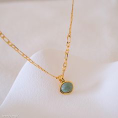 Elevate your style with our dainty jade necklace, featuring a striking green jade pendant on a chunky gold chain. This elegant piece seamlessly blends the natural beauty of green jade with the bold sophistication of a chunky gold chain, making it perfect for adding a touch of luxury to any outfit. Ideal as a gift for her, this natural green stone jewelry is versatile enough for both casual and formal occasions. Discover the timeless charm of this unique necklace, designed to enhance any look wit Elegant Jade Necklace With Adjustable Chain, Green Necklaces With Gold Chain For Gifts, Green Necklace With Gold Chain Gift, Gold Jade Round Pendant Necklace, Gold Jade Pendant Necklace, Gold Jade Necklace With Round Pendant, Jade Clavicle Chain Necklace, Green Round Chain Necklace, Green Gold Plated Necklace With Adjustable Chain