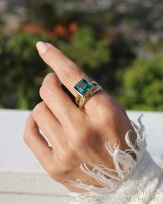 18k Step Cut Blue Topaz Golden Alchemy Ring, GAR02 - Etsy Gold Blue Topaz Ring Emerald Cut, Luxury 14k Gold Topaz Ring With Vs Clarity, Gold Emerald-cut Blue Topaz Ring, Gold Aquamarine Ring With Gemstone Accents, Step Cut, Alchemy, Blue Topaz, Statement Rings, Topaz