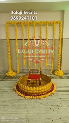 a chair sitting on top of a wooden table in front of a sign that says bali events