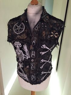 Halloween Festival Sleeveless Vest, Edgy Halloween Vest For Alternative Fashion, Sleeveless Halloween Festival Vest, Punk Style Sleeveless Vest For Festival, Sleeveless Vest For Halloween Festival, Fitted Grunge Vest For Concerts, Halloween Grunge Sleeveless Vest, Grunge Sleeveless Vest For Halloween, Sleeveless Grunge Vest For Halloween