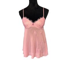 Embrace The Enchantment Of Victoria's Secret With This Delicate Pink Lace Babydoll Lingerie. The Floral Embroidery Whispers Elegance, While Adjustable Straps Ensure A Perfect Fit. Lace Cups With Floral Embroidery Adjustable Straps For Custom Fit Soft, Flowing Fabric Hook-And-Eye Closure At Back Brand: Victoria's Secret Bust To Hem = 22 Inches Size: Womens 36c Condition: New Without Tags Grit_n_grace_ Victoria's Secret Feminine Sleepwear With Built-in Bra, Victoria's Secret Coquette Lace Sleepwear, Pink Lace Camisole In Coquette Style, Pink Lace Coquette Camisole, Coquette Style Camisole For Night, Victoria's Secret Lace Sleepwear With Built-in Bra, Pink Lace Sleep Camisole, Pink Lace Camisole For Sleep, Pink Camisole With Built-in Bra For Bedtime