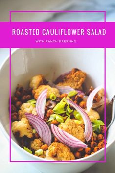 roasted cauliflower salad with ranch dressing in a white bowl on top of a table