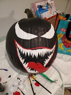 a large balloon with a face painted to look like a spiderman's mouth