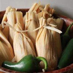 corn on the cob and peppers in a bowl