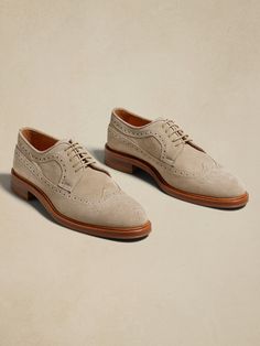 A timeless choice for those who prefer a bit of ornament, this Italian suede brogue had signature detailing, a wingtip toe, and beautifully burnished finish—a testament to Portuguese craftsmanship.  Italian suede uppers.  Waxed laces.  Leather soles.  Made in Portugal.  Whole and half sizes. Cream White Color, White Dress Shoes, Wingtip Shoes, What Should I Wear, Wingtip Oxford, Shoe Game, Cream White, Banana Republic, Men's Shoes