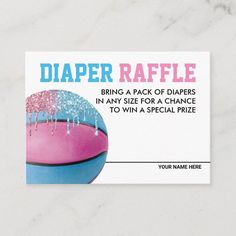 a pink and blue basketball with the words diaper raffle on it's back