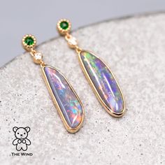 Stylish Australian Fossil Shell Opal Diamond Tsavorite Drop Earrings 18K Yellow Gold. Opalized Shell Fossil is very rare compared with regular opal. Free Domestic USPS First Class Shipping! Free One Year Limited Warranty! Free Gift Bag or Box with every order! Opal—the queen of gemstones, is one of the most beautiful and rarest gemstones on earth. Every piece of opals has its colors and patterns, which is perfect for designers to create unique engagement rings for someone extra special. We use 1 Tsavorite Yellow Gold Earrings For Gift, Yellow Gold Tsavorite Earrings As Gift, Gold Tsavorite Gemstone Earrings, Yellow Gold Tsavorite Gemstone Earrings, Yellow Gold Tsavorite Earrings Fine Jewelry, Gold Tsavorite Earrings Fine Jewelry, Green Emerald Multi-stone Earrings, Tsavorite Gemstone Earrings For May Birthstone, Rarest Gemstones