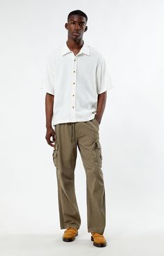 Whether you wear it for a special occasion or throw it on for a day at the skatepark, the Cream Boxy Button Down Shirt from PacSun is fashion-forward and can easily pair with the sick pieces in your closet. This button-down features a collared neckline, short sleeves, soft fabric, and a flattering fit. 


	Relaxed fit
	Short sleeves
	Collared neckline
	Button-down front closure
	PacSun branding
	100% Cotton
	Machine washable
	Model is wearing a size medium
	Model Measurements: 6'1”  Height, 34.5” Chest, 29" Waist Casual Beige Camp Collar Shirt, Casual Beige Camp Shirt With Relaxed Fit, Summer Khaki Shirt For Streetwear, Khaki Summer Streetwear Shirt, Casual Beige Relaxed Fit Camp Shirt, Casual Beige Cotton Camp Shirt, Beige Summer Streetwear Shirt, Summer Beige Streetwear Shirt, Beige Relaxed Fit Shirt For Streetwear