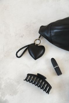 Our signature MANDRN genuine leather puffy heart keychain set is the perfect accessory to keep your keys together and reflect your style as you do. Black Keychains With Interior Key Chain Holder, Trendy Black Keychain With Key Leash, Fanny Pack Purse, Leather Keyring, Heart Keychain, Body Design, Keychain Set, Production Line, Puffy Heart