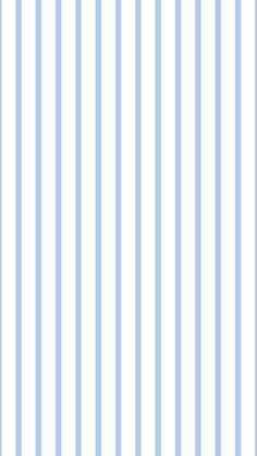 a blue and white striped wallpaper with vertical stripes