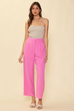 A pair of tailored pants in a wide-leg silhouette is a wardrobe must-have this season and beyond. This pleated high-rise trouser will surely become a favorite for giving your outfits a polished, put-together feel. •High-rise waist •Zip fly with hook and bar closure •Pleated front •Welt pockets at back •Wide-leg silhouette •Front Pockets Item Number: 74363 Pink Cropped Top, Fashion Trousers Women, Blue Pants Outfit, Women Trousers Design, Costume Pants, Luxe Boutique, Pink Costume, Trouser Design, Sailor Fashion