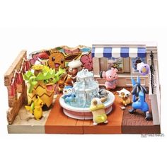 an assortment of pokemon figurines on display