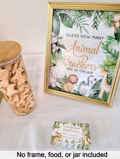 an animal crackers jar next to a sign and card