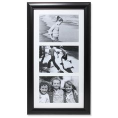 three black and white photos hanging on a wall next to a framed photo with two children