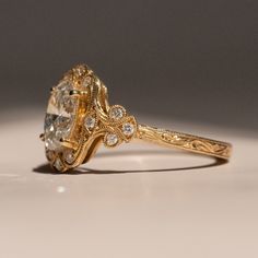 Luxury Classic Gold Diamond Ring, Luxury Vintage Engraved Ring With Diamond Accents, Luxury Timeless Yellow Gold Crystal Ring, Antique Mothers Ring, Luxury Heirloom Diamond Filigree Ring, Luxury Engraved Yellow Gold Ring With Prong Setting, Ornate Gold Engagement Ring, Gold Edwardian Ring, Vintage Wedding Rings 1920s Gold