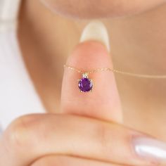 "Our single diamond tiny round amethyst necklace is an elegant jewel to wear whenever you want. A meaningful gift that can be given as a birthday gift to those born in February 🤍🤍 Special gifts for your special moments. We produce our jewelery for you in the most perfect way. 🤍🤍 All of our products are carefully crafted from 14K Solid Gold and Real Diamonds. FEATURES * Made to order. * Gold Color Selection: Yellow Gold, Rose Gold, White Gold * Gold KT: 14K * Length: 14\", 16\", 18\", 20\", 2 Dainty Purple Diamond Jewelry, Dainty Purple Necklace For Anniversary, Purple Dainty Necklace For Anniversary, Purple Round Necklace With Prong Setting, Purple Diamond Birthstone Necklace, Purple Necklace With Prong Setting As A Gift, Purple Necklace With Prong Setting, Gift, Amethyst Necklaces With Diamond Accents For Gifts, Purple Diamond Round Necklace