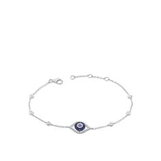 This delicate station bracelet is elevated with a blue sapphire evil eye. The combination of diamond and sapphire shows off an eye-opening shine. Crafted with 14k white gold, the simple clasp allows for easy everyday wear. Station Bracelet, Diamond Huggies, Gold And Blue, Eye Opening, Eye Bracelet, Evil Eye Bracelet, Emerald Cut Diamonds, Emerald Cut, Evil Eye