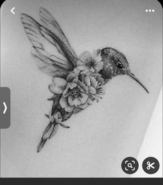 a drawing of a hummingbird with flowers in its beak