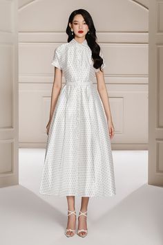 Crafted from a luxuriously soft taffeta material, it features a classic shirt collar, fit and flare style, and a beautiful midi length. Perfect for any elegant occasion. Elegant Short Sleeve Satin Midi Dress, Elegant Silk Midi Dress With Full Skirt, Elegant Polka Dot Midi Dress For Evening, Elegant Knee-length Polka Dot Dress, Polka Dot Midi Dress For Formal Occasions, Elegant Short Sleeve Polka Dot Midi Dress, Elegant Polka Dot Silk Dress, Formal Polka Dot Midi Dress, Elegant Silk Polka Dot Dress