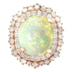 7.70 Carat Natural Opal 14K Solid Rose Gold Diamond Ring Item Type: Ring Item Style: Cocktail Material: 14K Rose Gold Mainstone: Opal Stone Color: Multicolor Stone Weight: 5.70 Carat Stone Shape: Oval Stone Quantity: 1 Stone Dimensions: 14.00x12.00 mm Stone Creation Method: Natural Stone Treatment Method: Not-treated Gemstone 1: Diamond Stone Color: F-G Stone Clarity: VS2-SI1 Stone Weight: 2.00 Carat Stone Shape: Round Stone Creation Method: Natural Stone Treatment Method: Not-treated Total All Rose Gold Opal Ring, Opal Diamond Ring, Ring Rosegold, Rose Gold Diamond Ring, 14k Rose Gold Ring, Pink Morganite, Diamond Cocktail Rings, Rose Gold Pink, Gold Diamond Ring