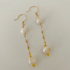 Gold, Dangle, Pearl, Long, Elegant, Earrings Minimalist Pearl Linear Earrings For Formal Occasions, Elegant Gold Pearl Linear Earrings, Classic Pearl Chain Dangle Earrings, Minimalist Gold-plated Dangle Pearl Earrings, Minimalist Gold Plated Dangle Pearl Earrings, Elegant Gold Earrings With Simple Design, Elegant Simple Design Gold Earrings, Delicate Gold Linear Earrings With Pearl Drop, Dainty Pearl Drop Linear Earrings