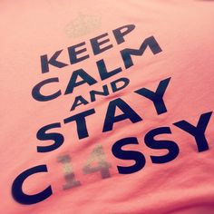 a pink shirt that says keep calm and stay classy