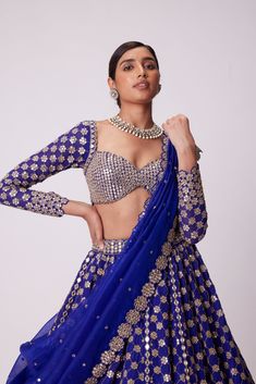 Persian Blue Mirror Flower Embroidered Lehenga And Dupatta Clubbed with Real Hand Cut Mirror Embroidered FullSleeve Blouse.From Vvani Vats Jugmug's collection.DELIVERY TIMEPlease allow 8-12 weeks for your outfit to arrive.FABRIC DETAILSLehanga - Organza Dupatta - OrganzaBlouse - GeorgetteProfessional cleaning only. Vani Vats, Full Sleeve Blouse, Mirror Embroidery, Weddings Receptions, Blue Lehenga, Persian Blue, Embroidered Lehenga, Indian Wedding Wear, Blue Mirror