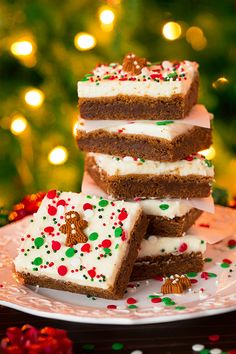 several pieces of cake sitting on top of a white plate